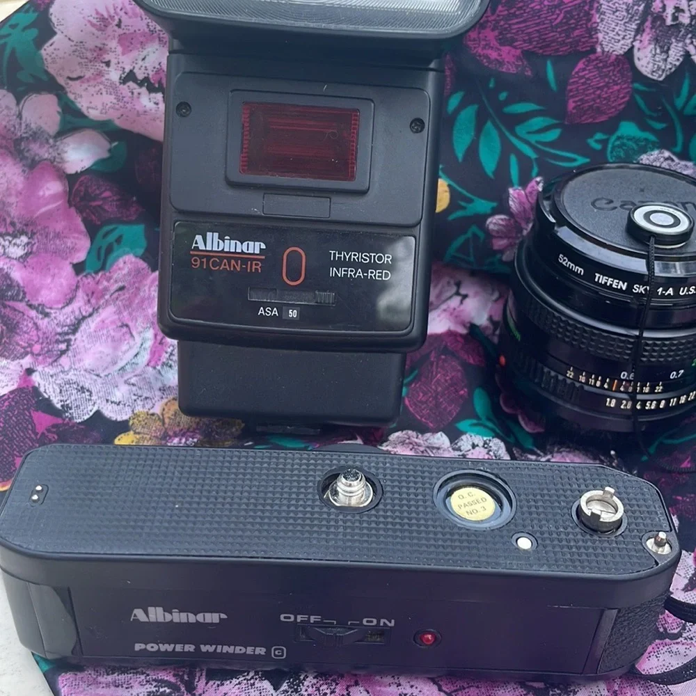 Canon ae 1 program camera with lenses and other accessories